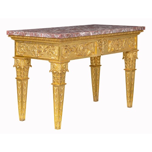 An Italian carved and giltwood neoclassical Console table, with a rectangular peperino top with Roman ancient alabastro a pecorelle veneer